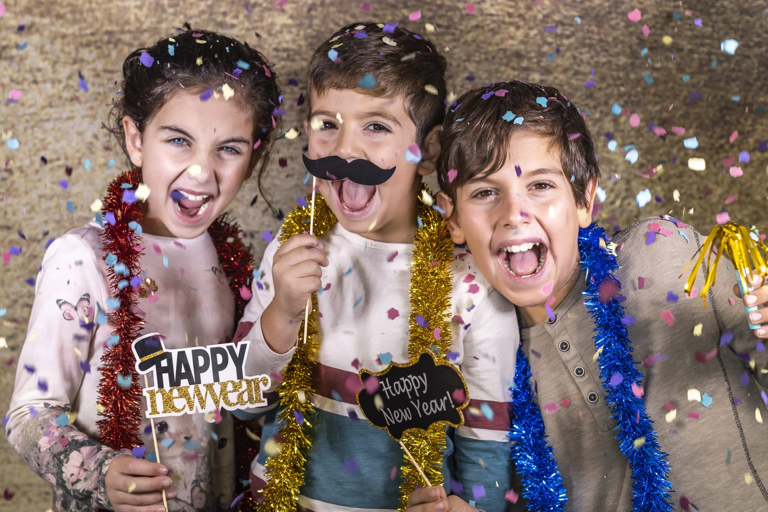 kids in fancy dress smiling at a family new years party in milton keynes