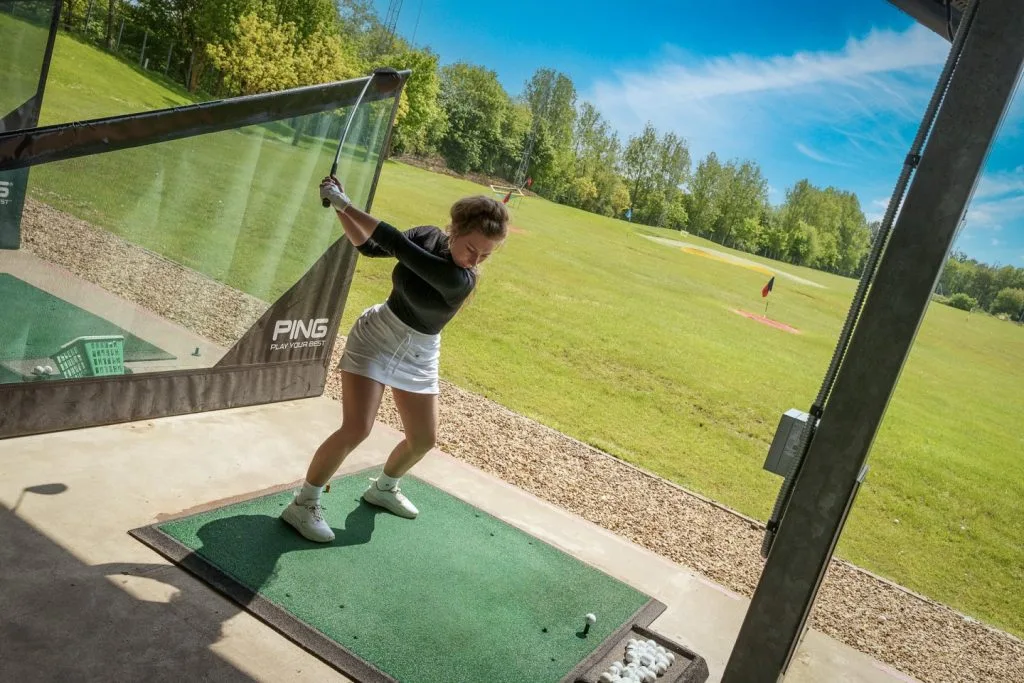 women hitting out of driving range in milton keynes