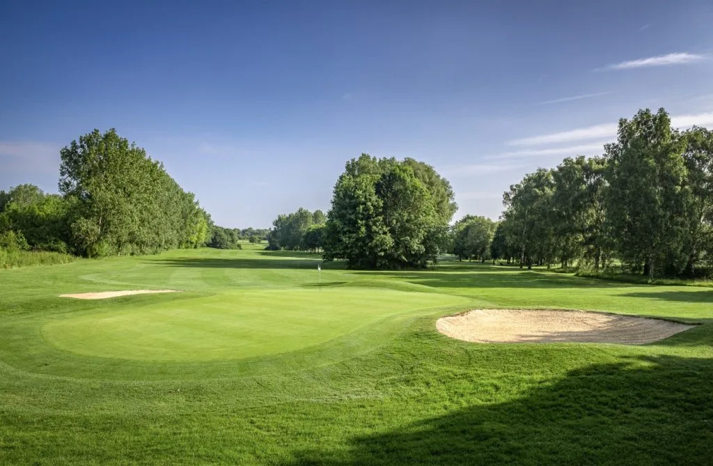 Golf course in Milton Keynes with a sunny sky, part of one of the leading golf courses in Buckinghamshire